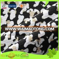 Stretch knitted jacquard moisture wicking cooling fabric